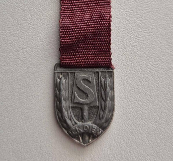 Badge of the Dutch Labour Service during German occupation ( NAD).