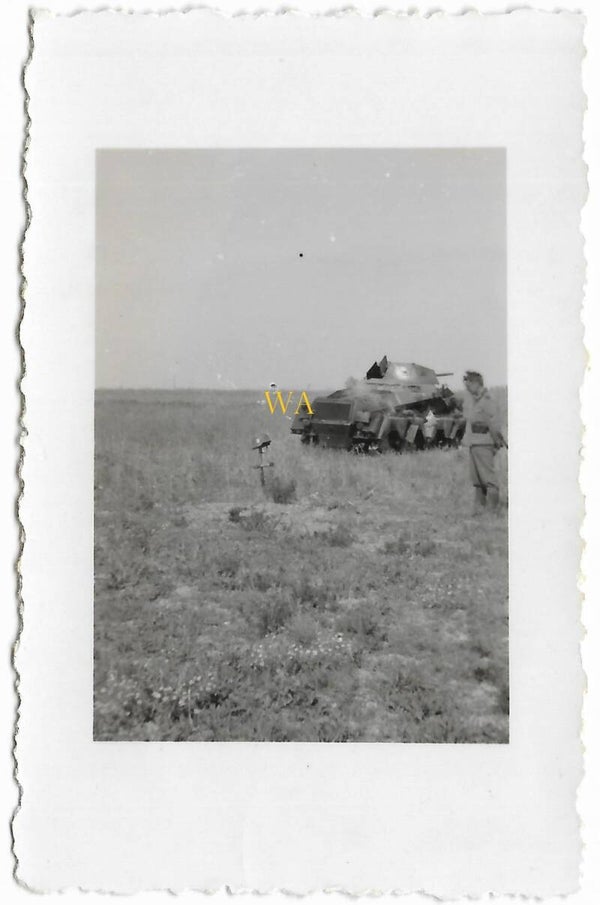 SS-Panzer vehicle at an SS-grave.