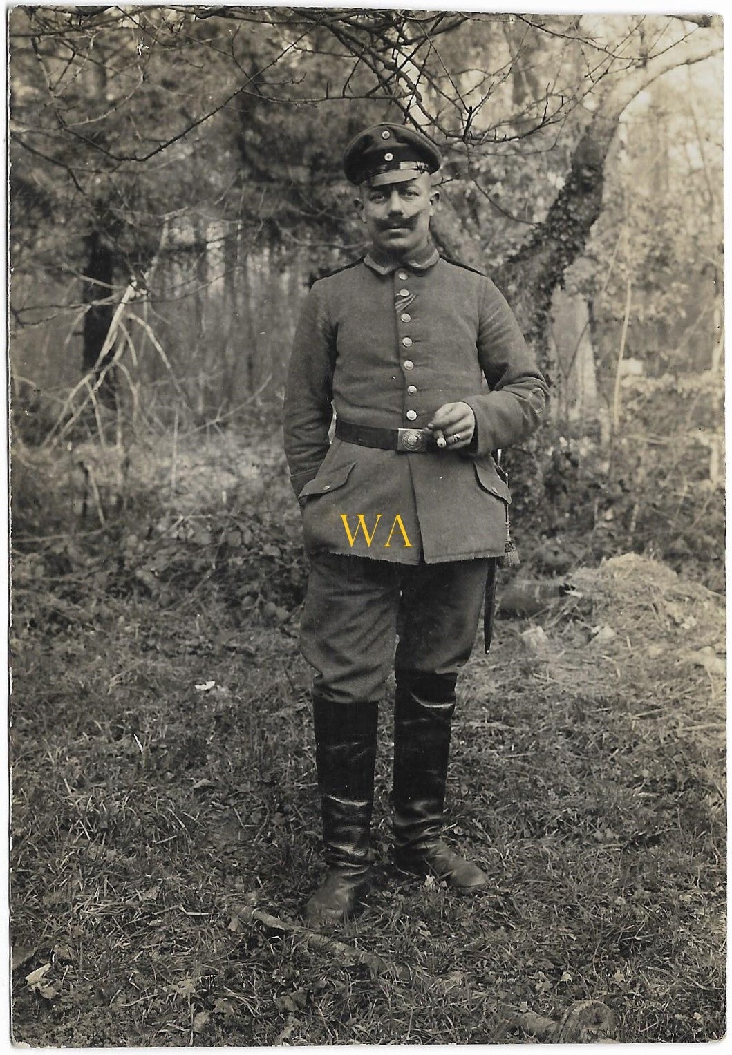 Portrait of a Feldwebel in Feldgrau with the ribbon of iron cross on the chest.