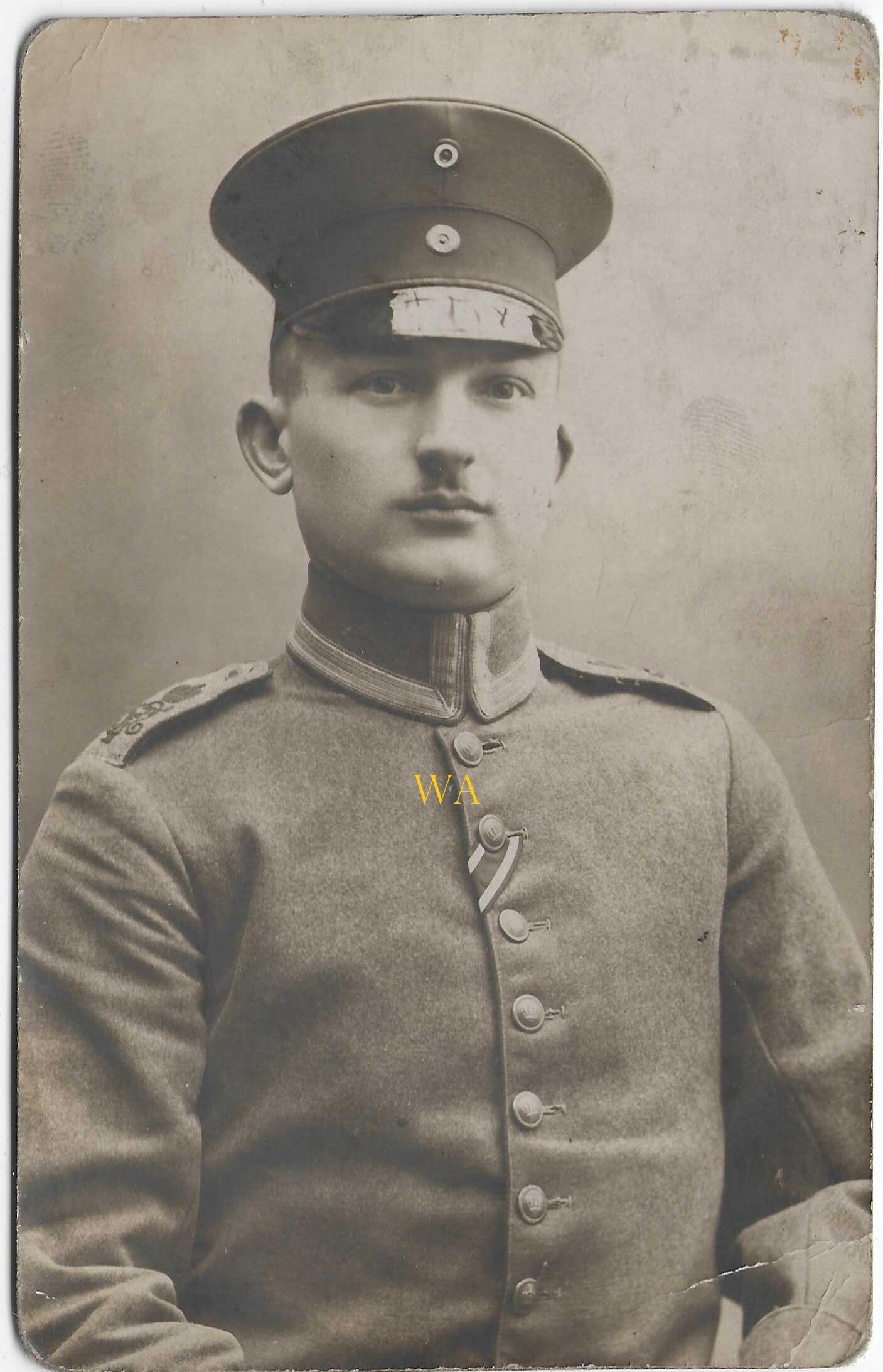 Studio portrait of a member of the 5. Thüringisches Infanterie-Regiment Nr. 63 in an M1910 Waffenrock.