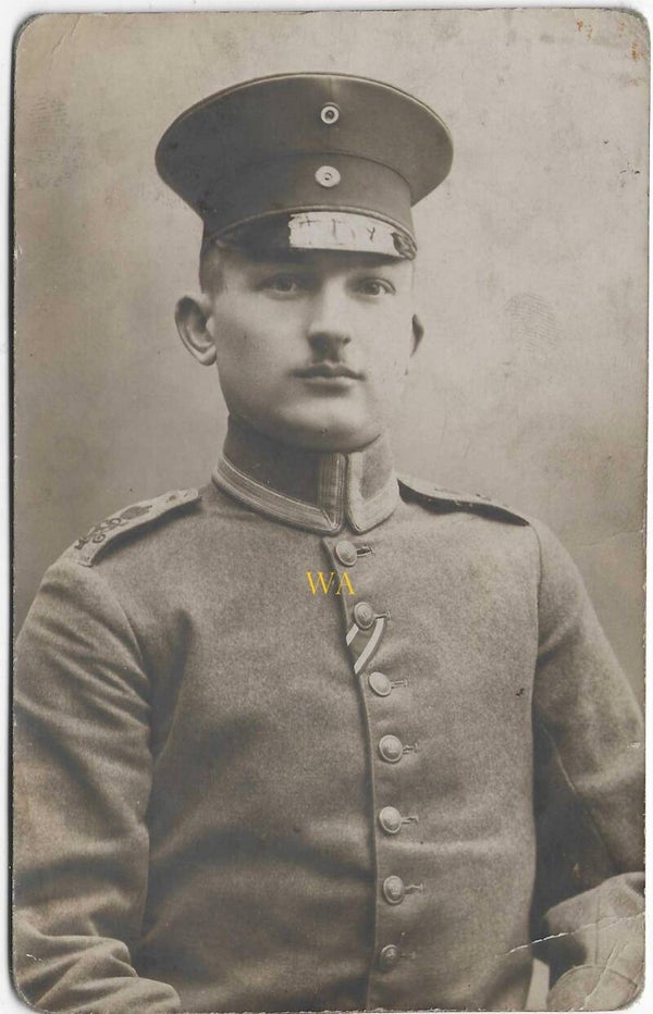 Studio portrait of a member of the 5. Thüringisches Infanterie-Regiment Nr. 63 in an M1910 Waffenrock.