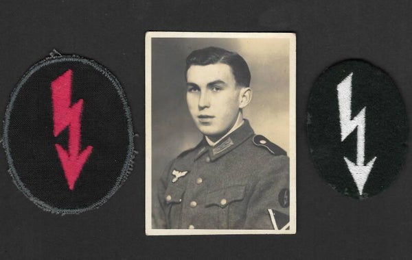 Passport photograph with two arm patches