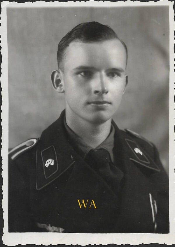 Studio portrait of a decorated Panzerman – a very sharp photograph!