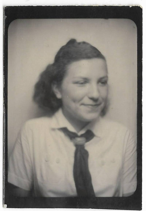 BDM girl with button and black border on the paper.