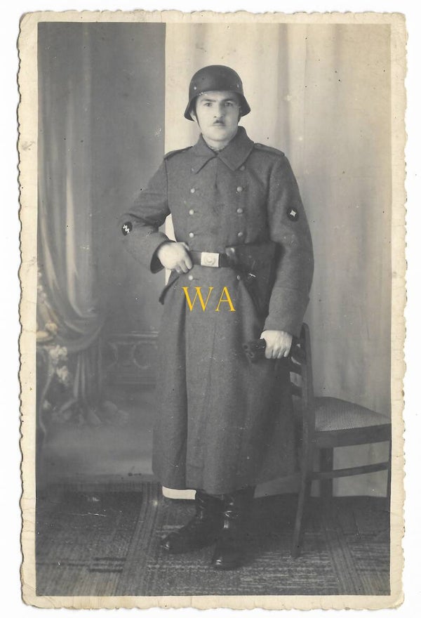 German 'Sanitäter' with Steel Helmet in standing pose.