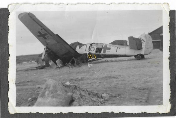 Destroyed Focke-Wulf aircraft with visible marking and 'balkenkreuz'
