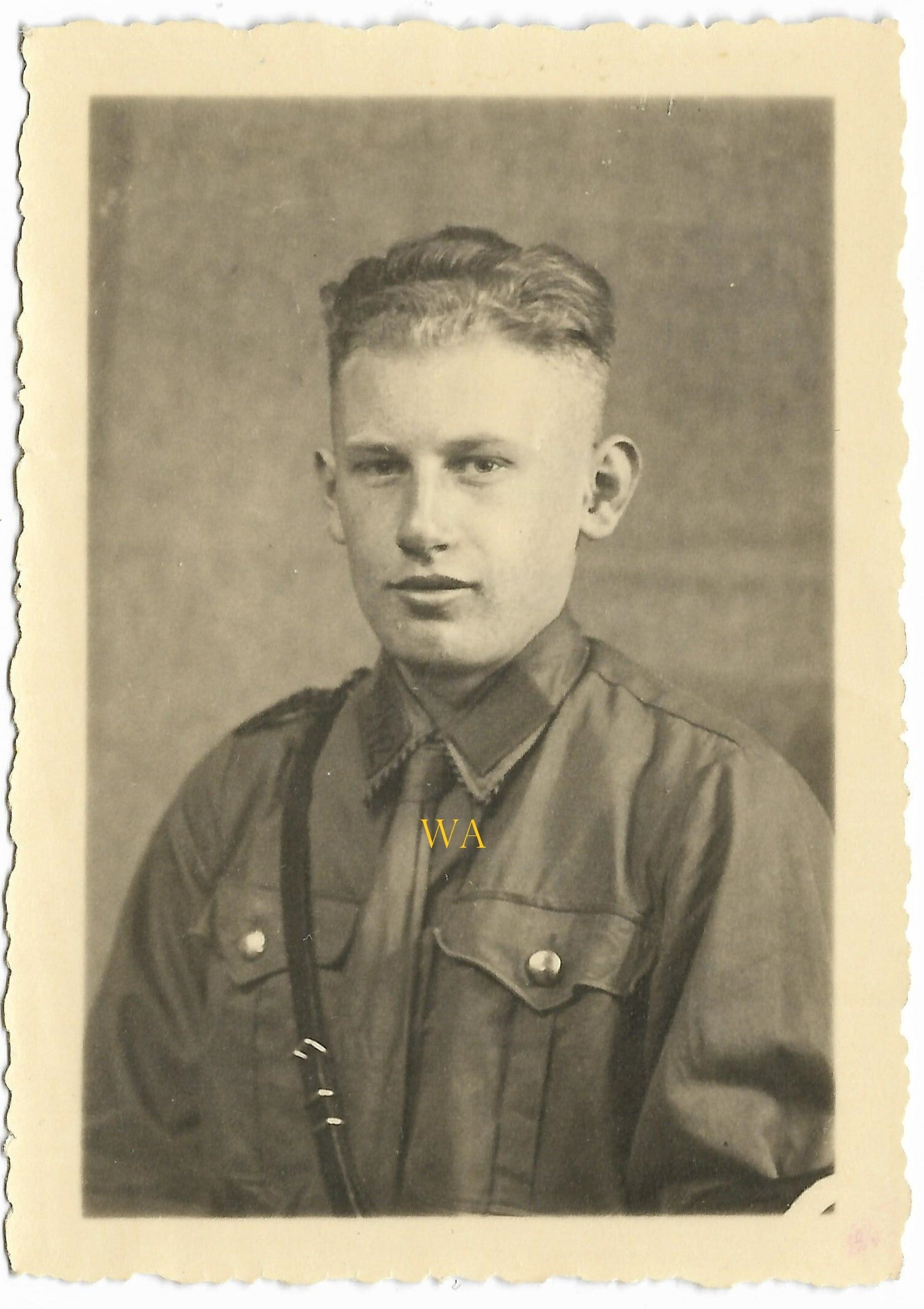 Studio portrait of an SA member with sleeve band.