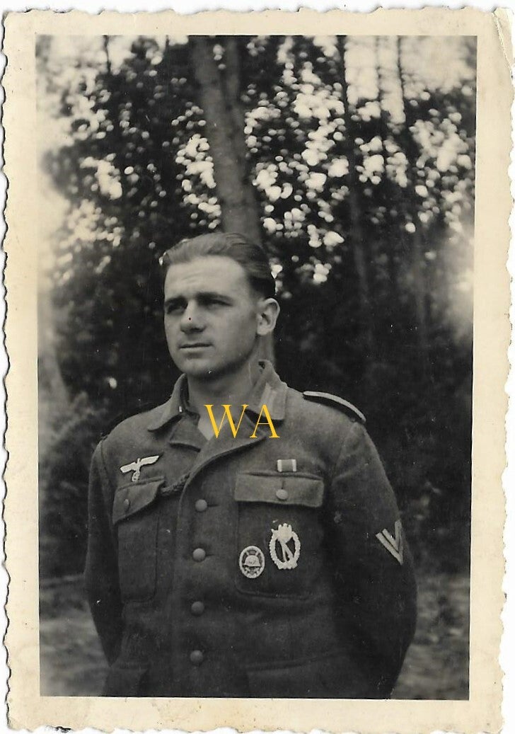 German soldier with the Infanterie Sturm Abzeichen and the Wound Badge.