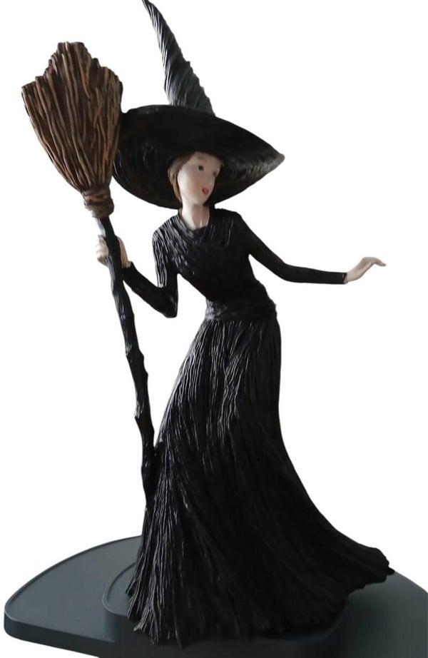 Witch holding a Broom ornament