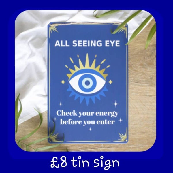 Evil eye metal sign