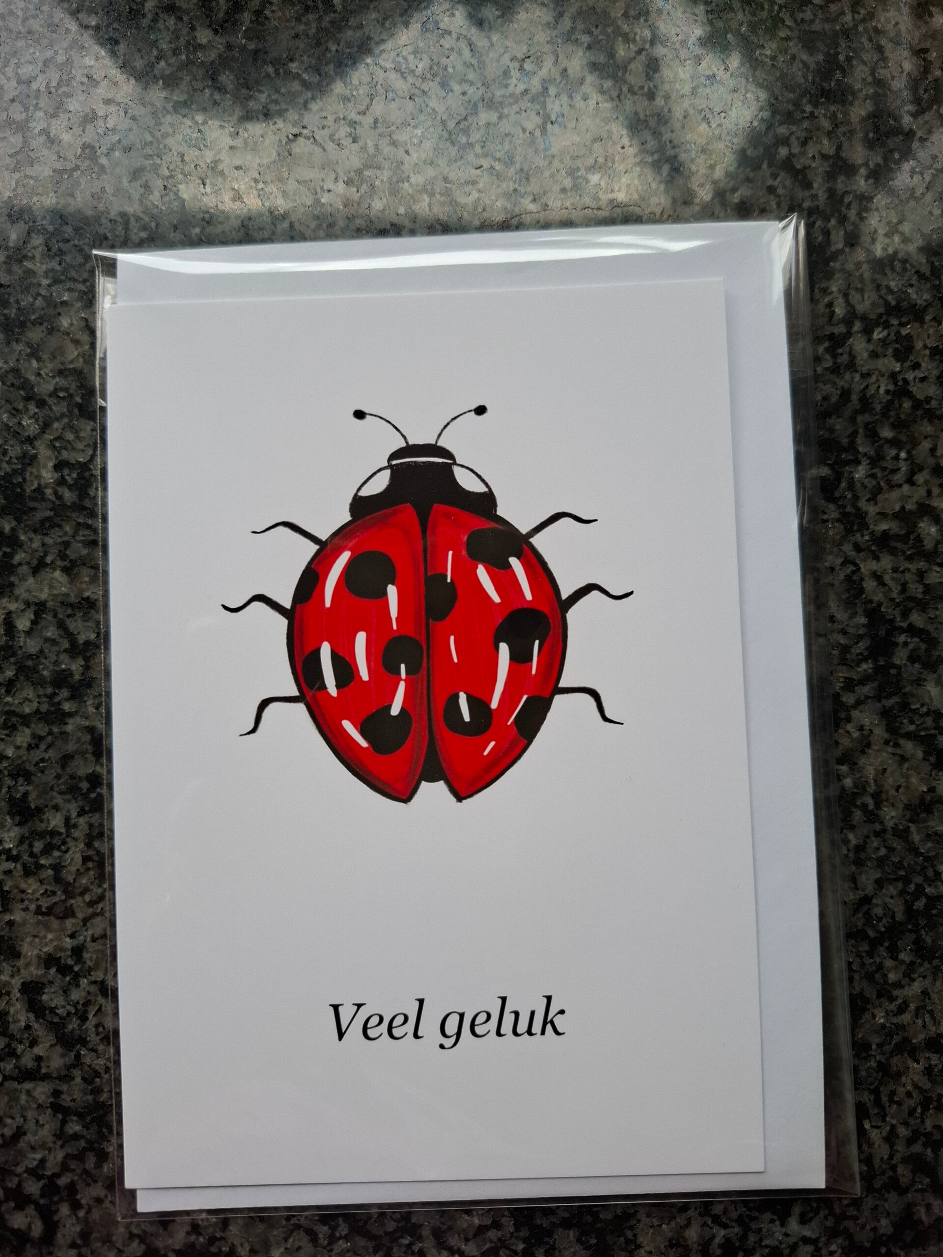 Kaart-lieveheersbeestje, veel geluk.