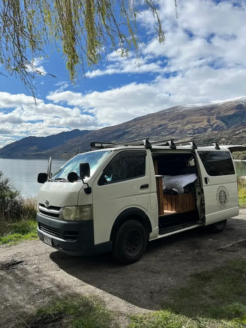 Hayley Williams relaxing with the Demeter campervan outdoor setup