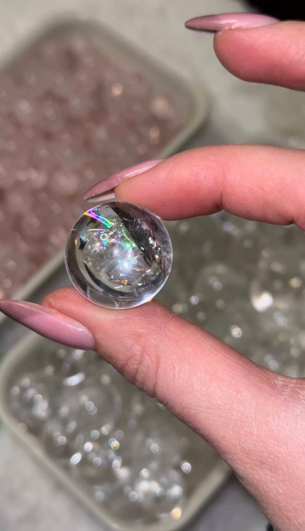 Mini clear quartz sphere with rainbow