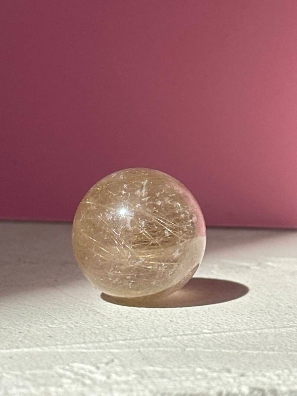 A grade Rutile in Quartz sphere