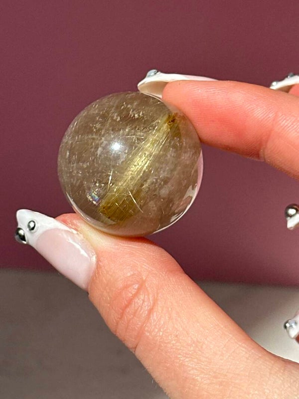 A grade Rutile in Quartz mini sphere