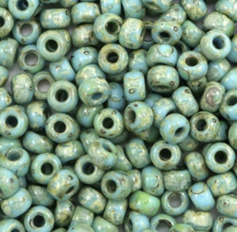 Miyuki rocailles 6/0. 4mm Opaque picasso turquoise blue 6-4514