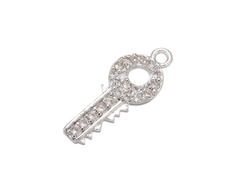 Bedel zirkonia sleutel zilver.