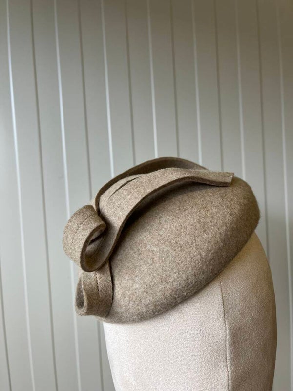 Tiener rond dopje beige gemeleerd Saar
