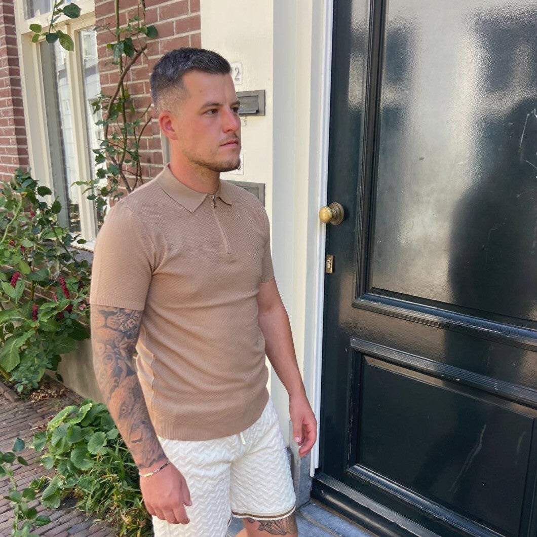 Polo beige rits