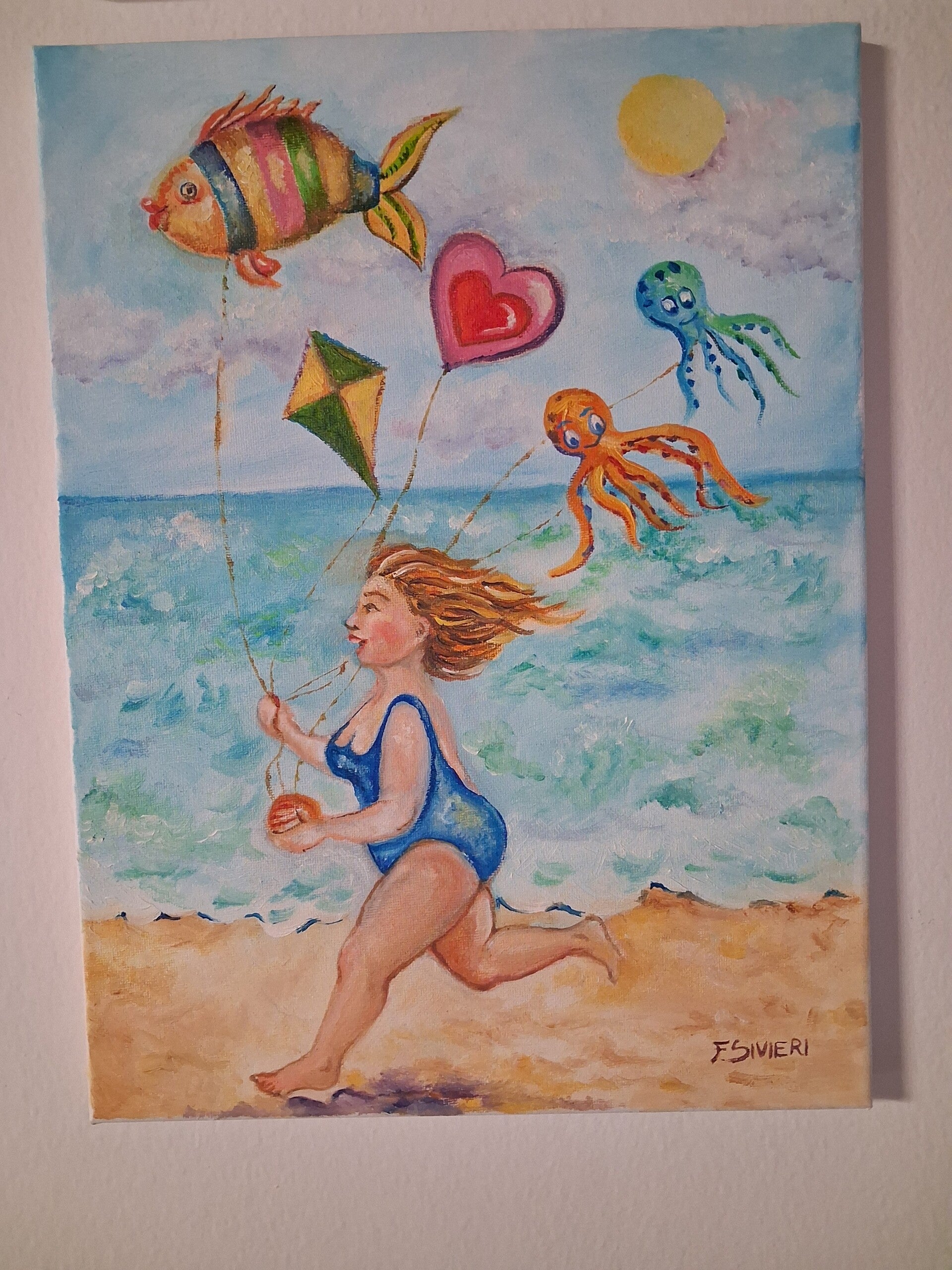 Al mare giocando
