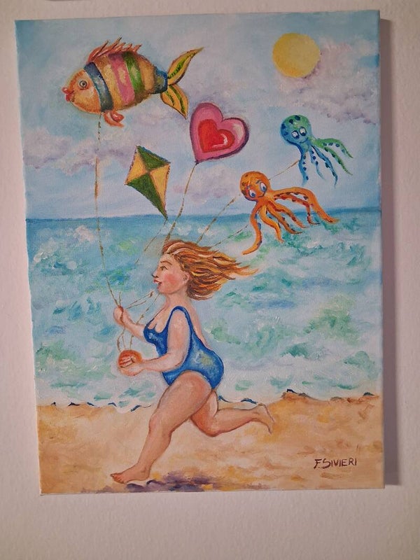 Al mare giocando