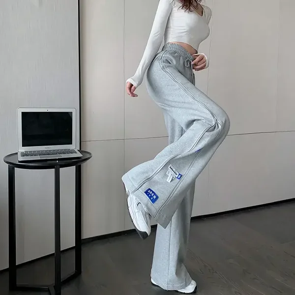Pantaloni lunghi da donna a vita alta e drappeggiati