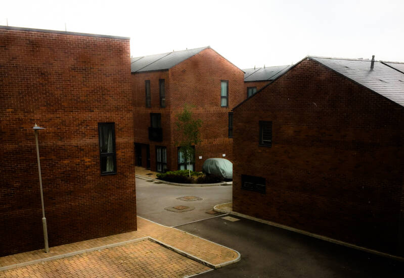 documentary photo of a car on a new housing estate, David Cross, CBDP Media, 2025,