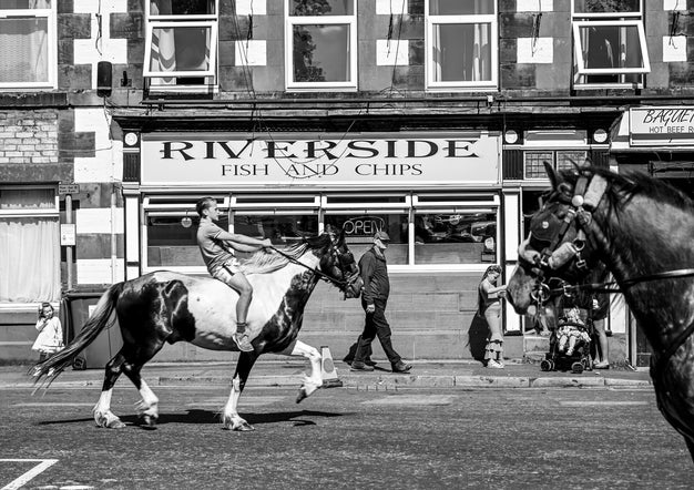 gypsy rides hores through town, england, from article by Cath Muldowney, pblished as a free read in Humanity online magazine,