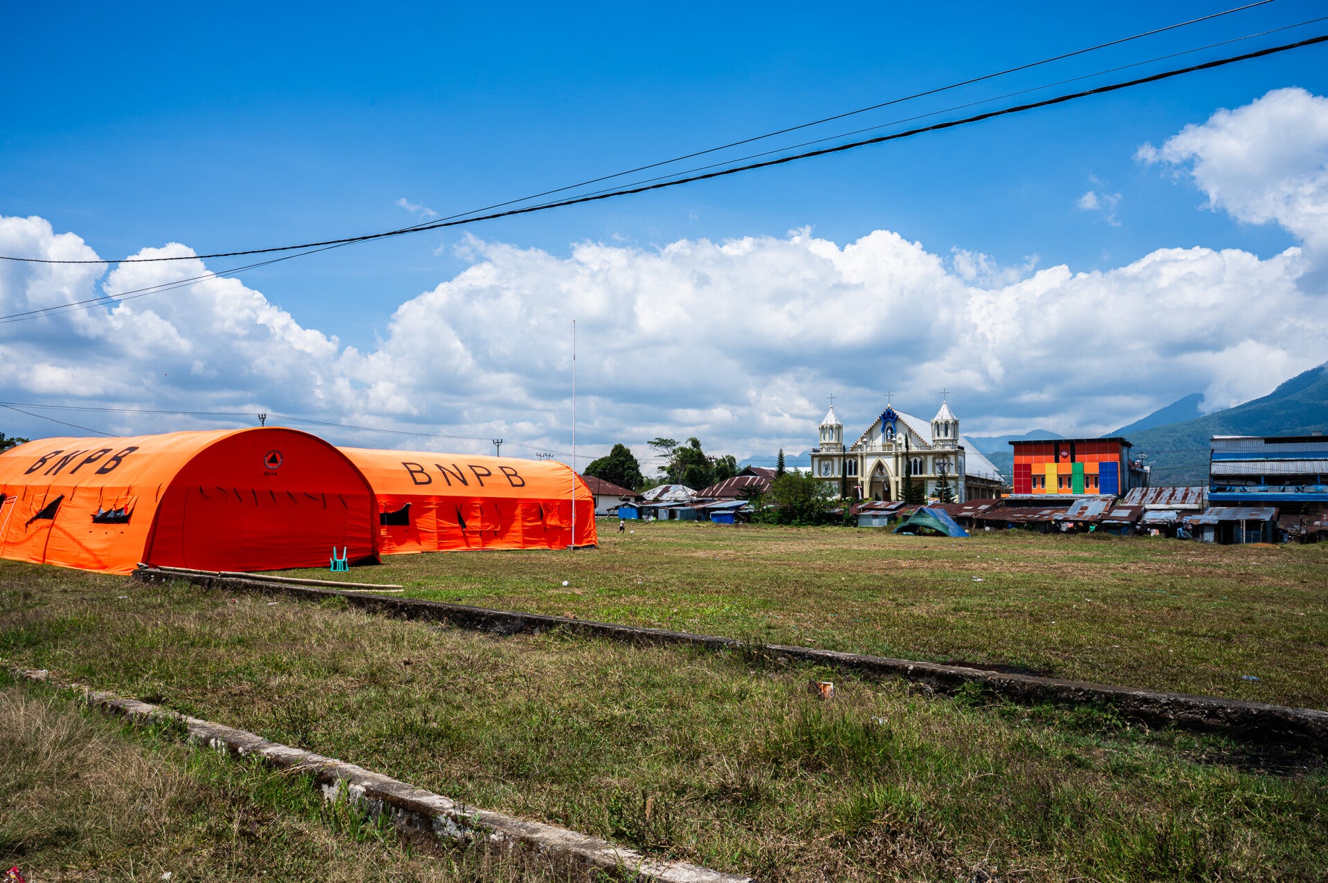 an emergency shelter erected in indonesia following an earrthquake that displaced the residents from the photo essay and written report by Davide Turbino,