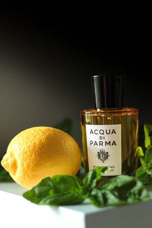 Acqua di Parma Buongiorno with lemon, basil and mint leaves