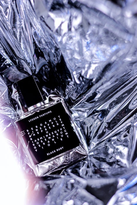 1. Close-up of Black Ruby perfume by Lydeen Parfums with dramatic light