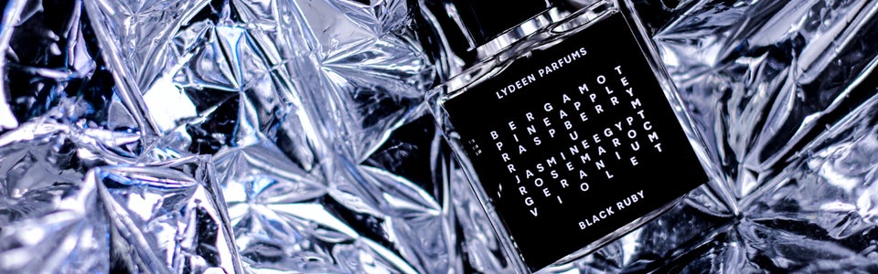 1. Perfume bottle of Lydeen Parfums Black Ruby with metallic background