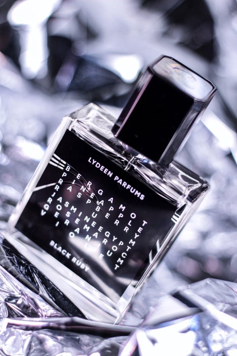 3. Dramatic product photography of a niche fragrance