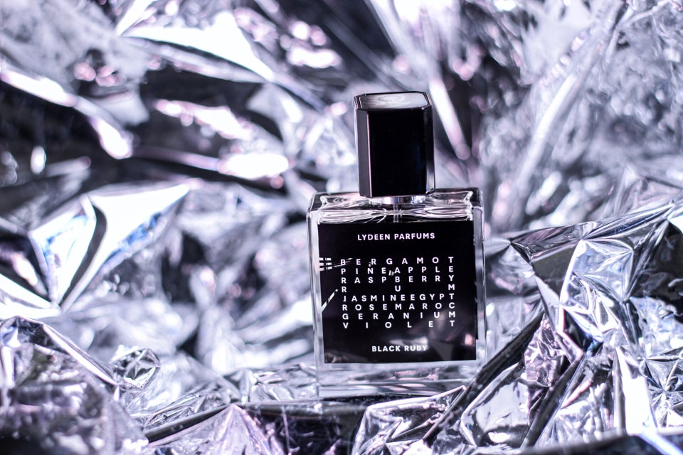 1. Futuristic background highlighting a luxury perfume