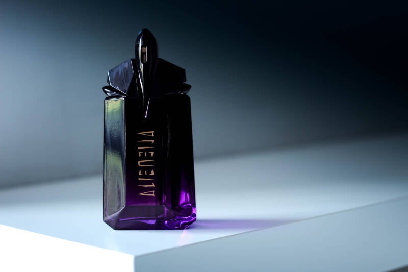Mugler Alien Extraintense photographed with soft shadows and bold contrast