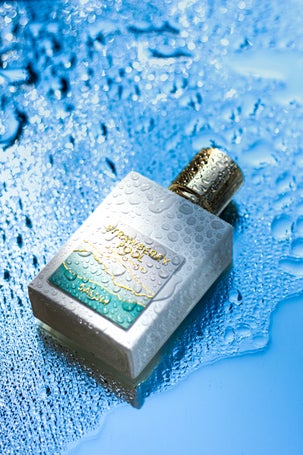 Water-drenched luxury perfume bottle from Salum