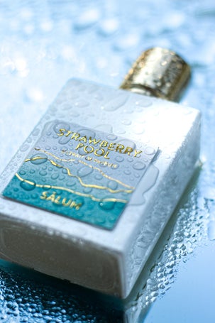 Luxurious and playful: Strawberry Pool perfume bottle dripping with freshness