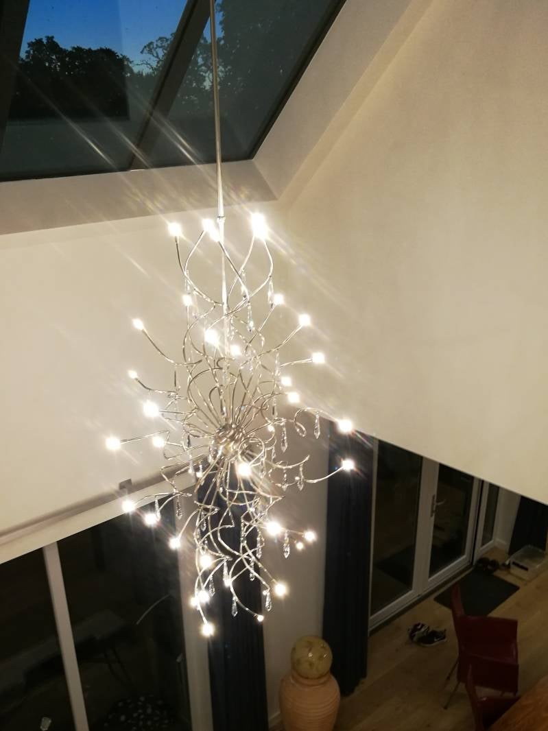 Super eyecatcher ! dat is deze vide lamp vervaardigd uit 6 mm RVS buis, mat geborsteld en uitgevoerd met 30%Pb Kristal.