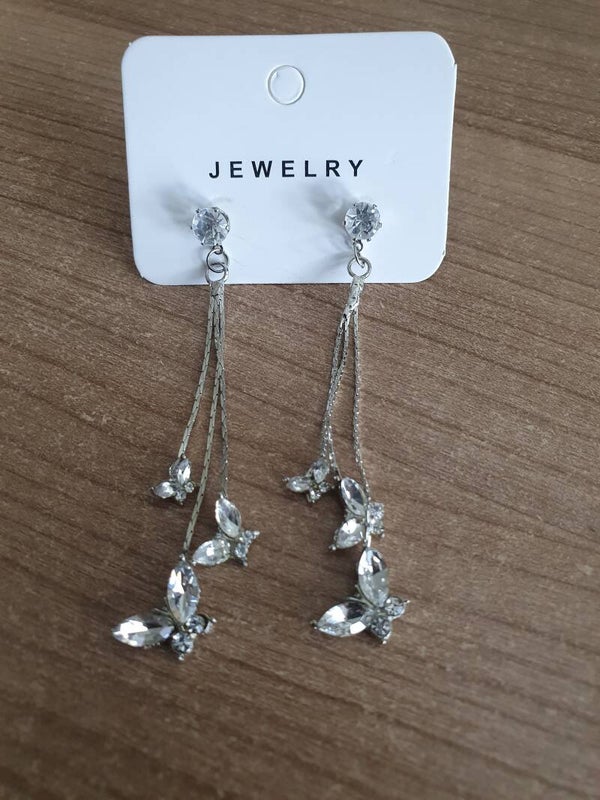 Zilverkleurige oorbellen vlinders