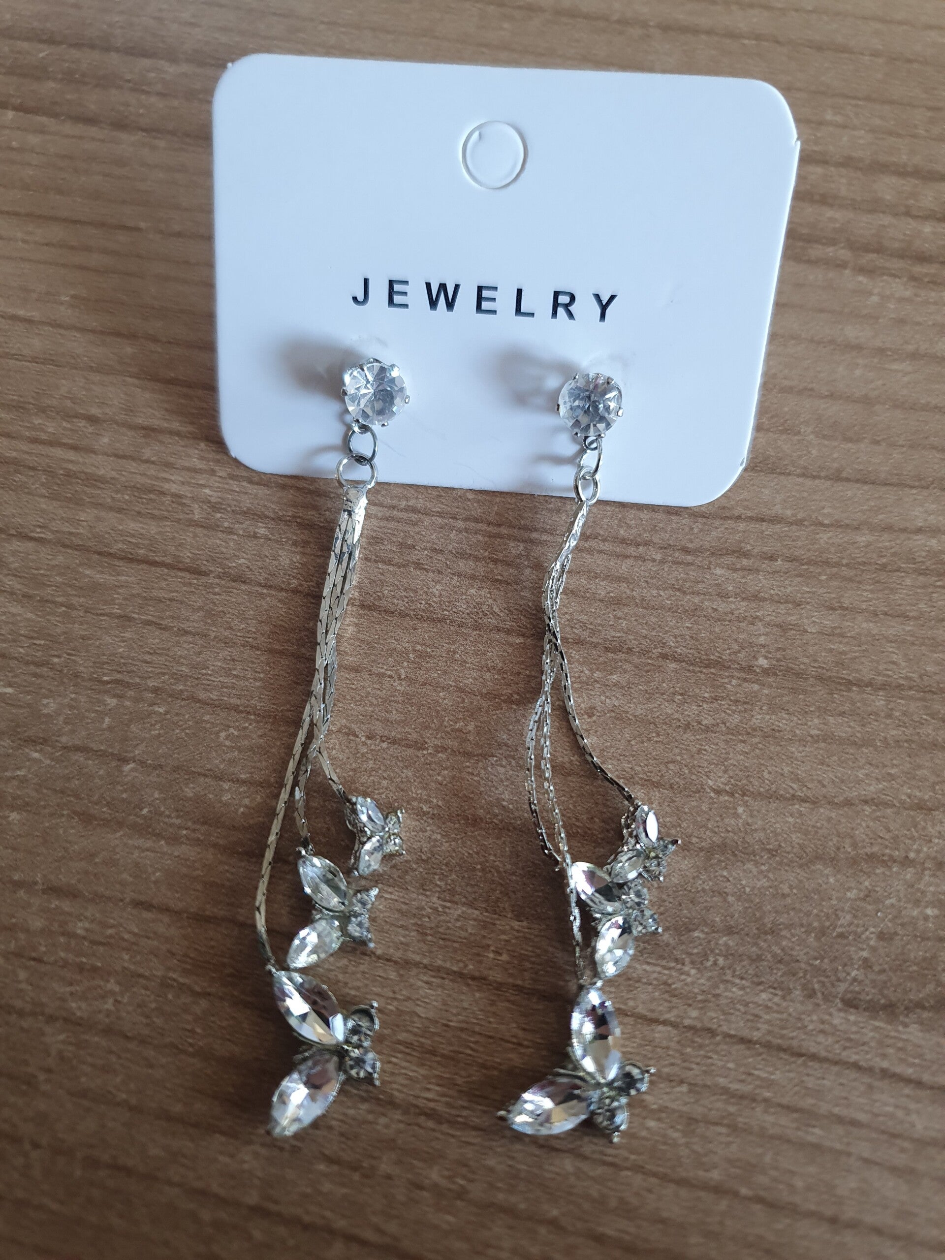 Oorbellen zilverkleurig vlinders lang