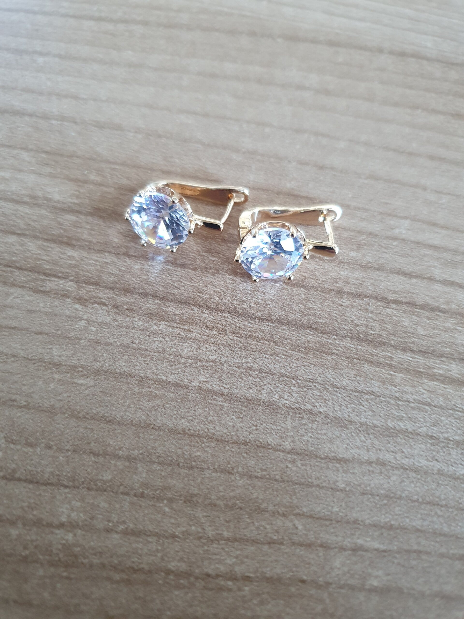 Oorbellen goudkleurig steen