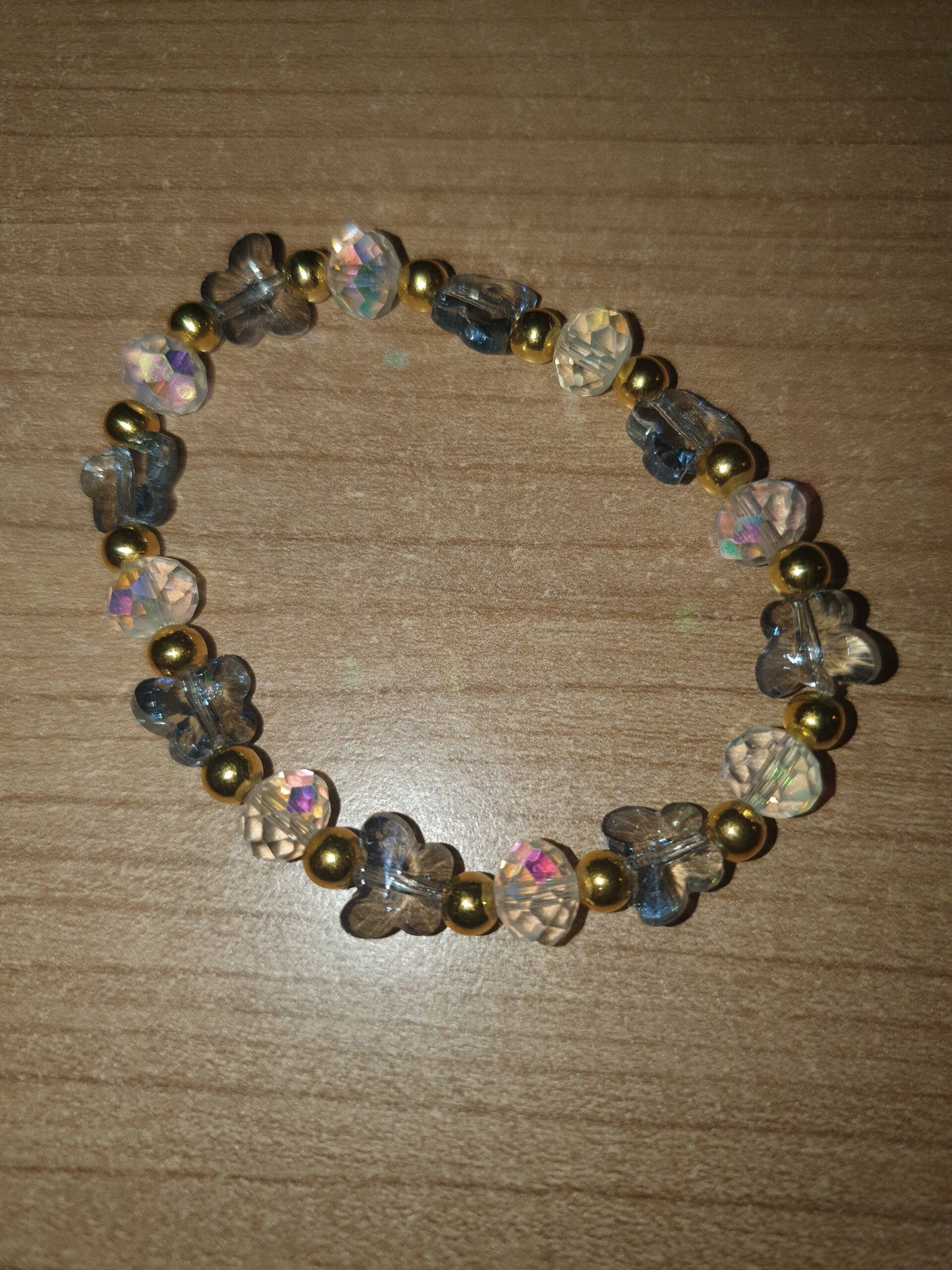 Armband blauwe vlinders / witte steentjes