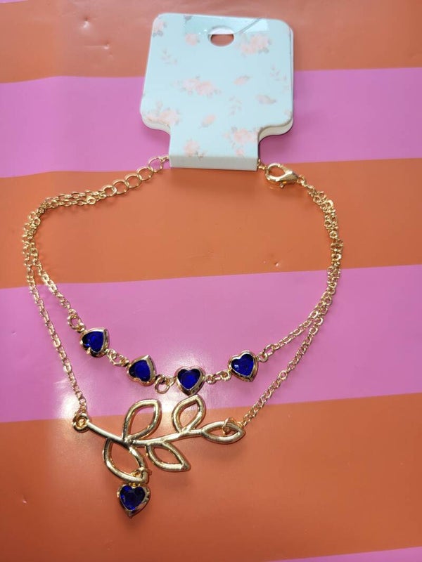 Goudkleurig enkelbandje blauw