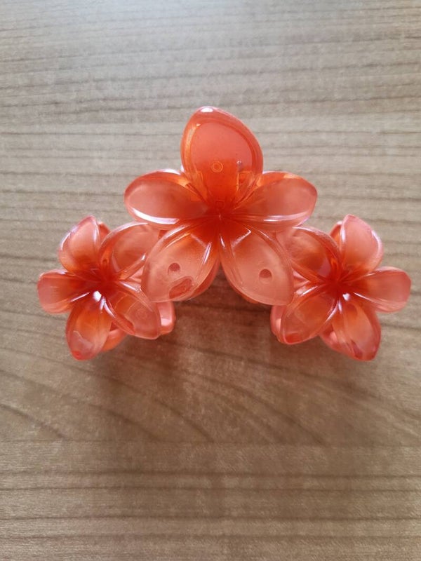 Klem oranje bloemen