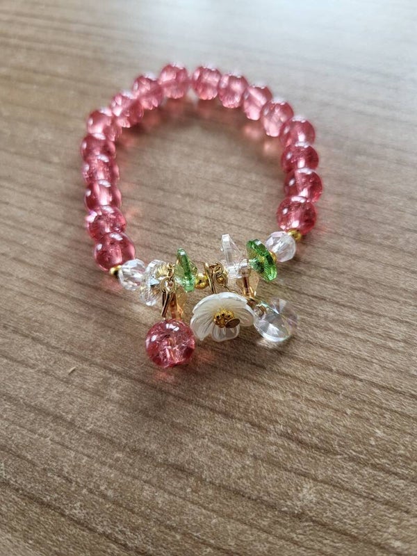 Kralenarmband bedels roze