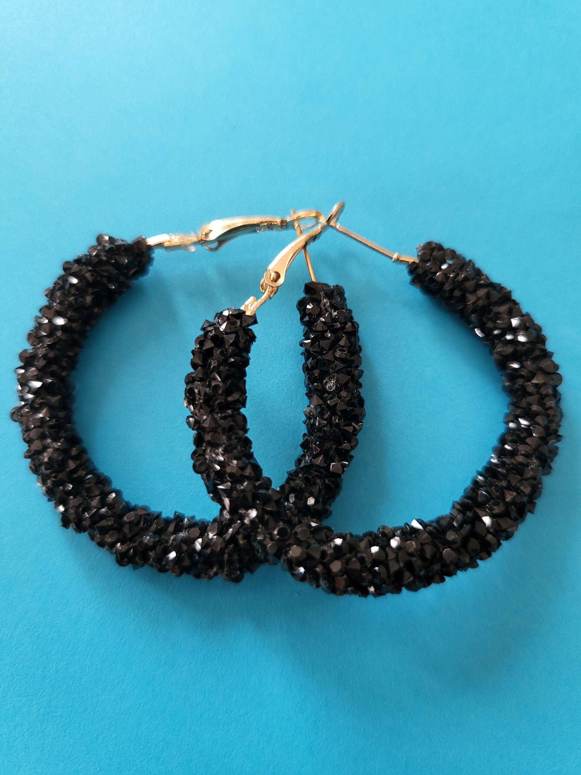 Oorbellen ringen zwart