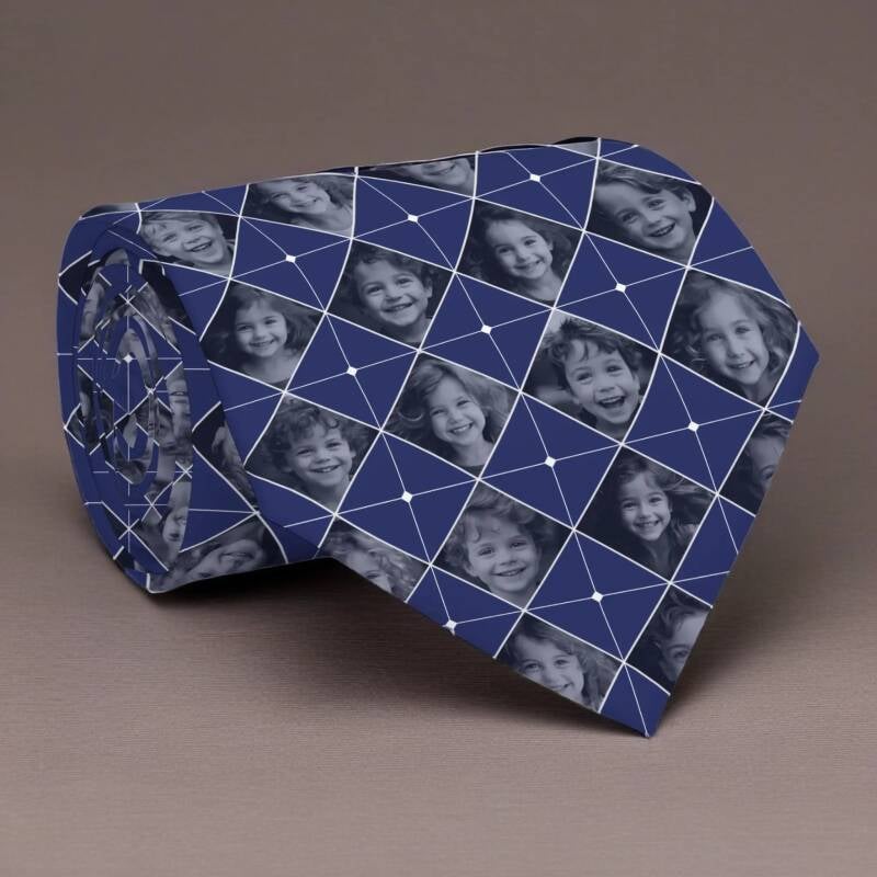 Custom photo patterned necktie featuring alternating diamond shaped photographs of several boys and girls on a blue background. This necktie accommodates up to 16 different photographs.