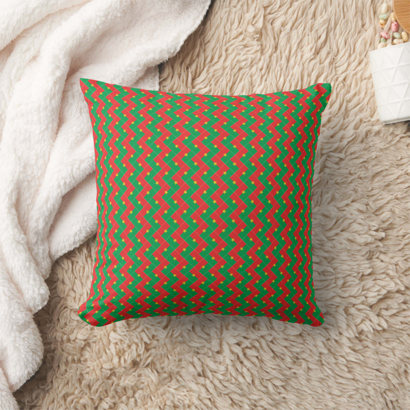 Decorative pillow with a patchwork pattern based on the Burkina Faso national flag.