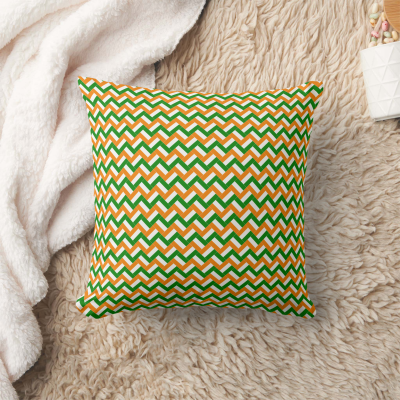 Decorative pillow with a patchwork pattern based on the Cote d'Ivoire national flag.