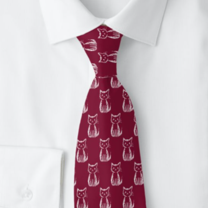 Burgundy necktie with a pattern of hand drawn cats.cats